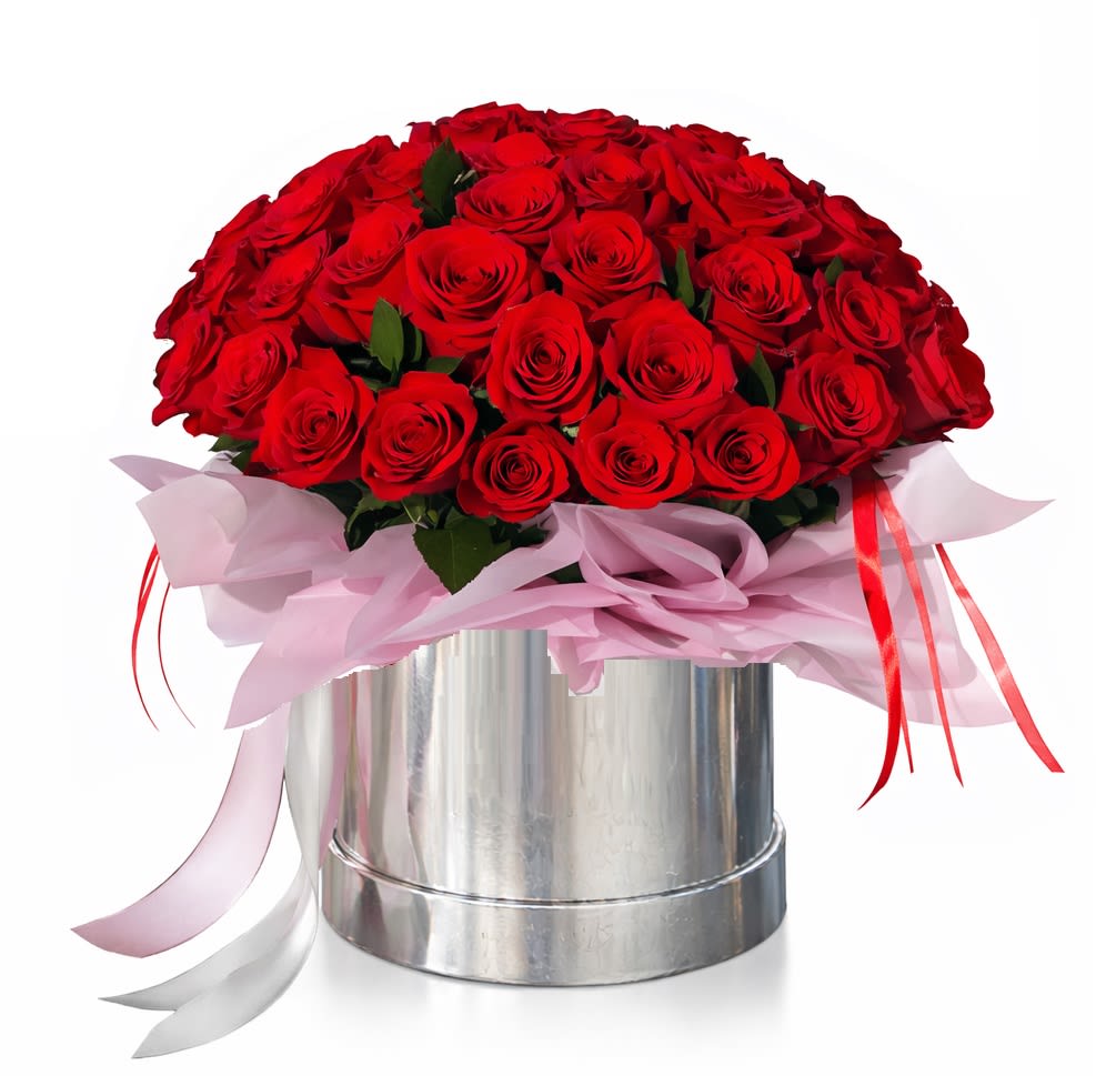 Radiant Rose Embrace. An arrangement by Geni's Florist and Gifts.