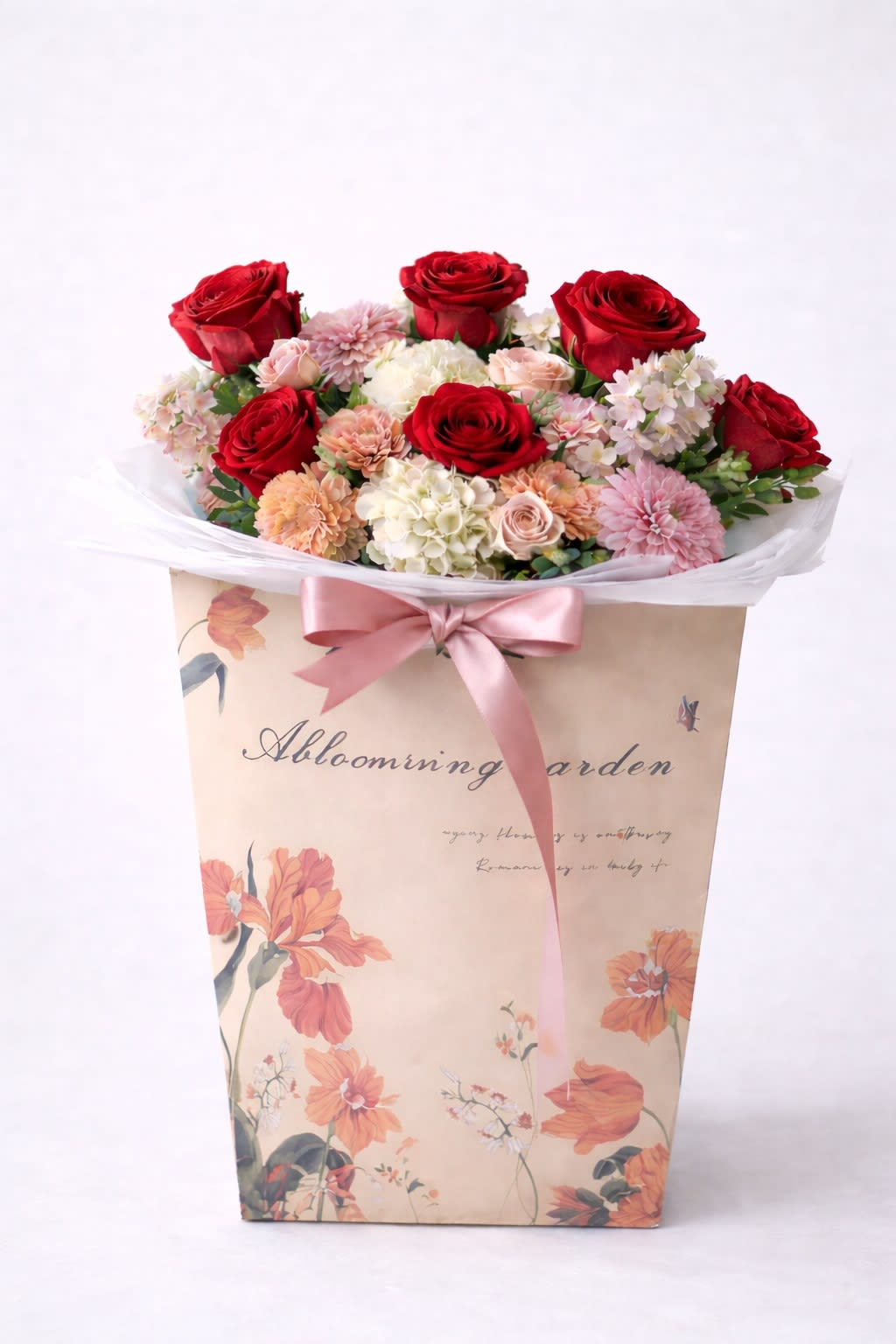 Romance to Go. An arrangement by Geni's Florist and Gifts.