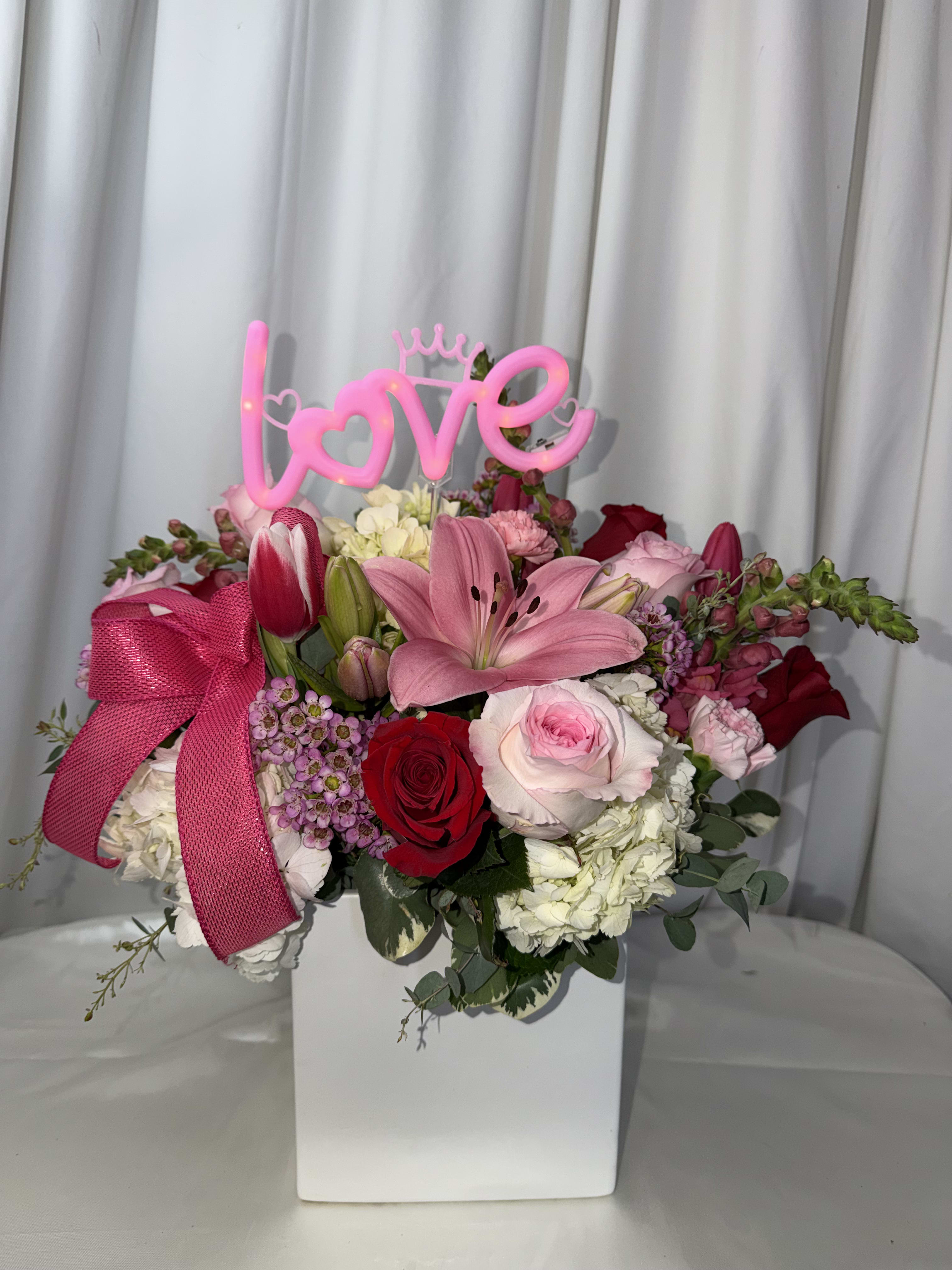 LUSH BLUSH 26. An arrangement by M's Flowers.