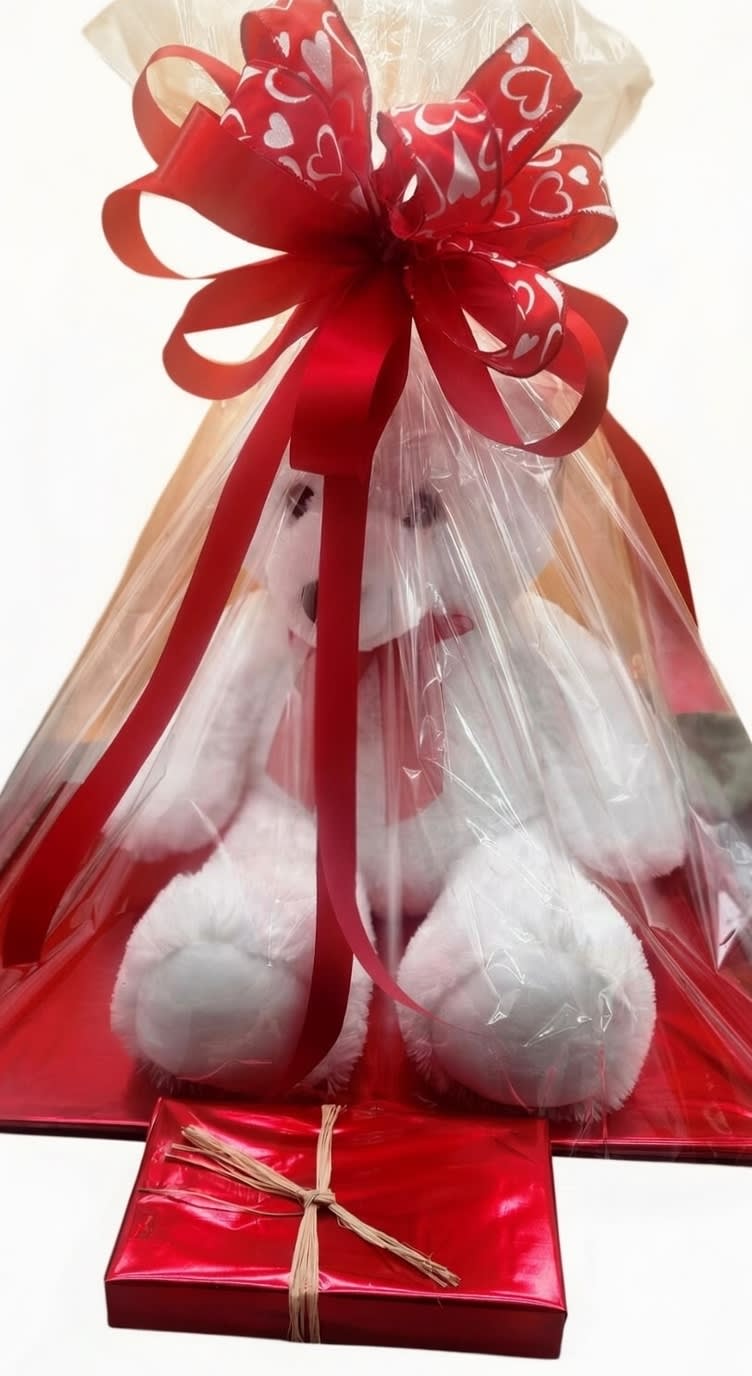 Big Teddy. An arrangement by Anne's Flowers and Gifts.