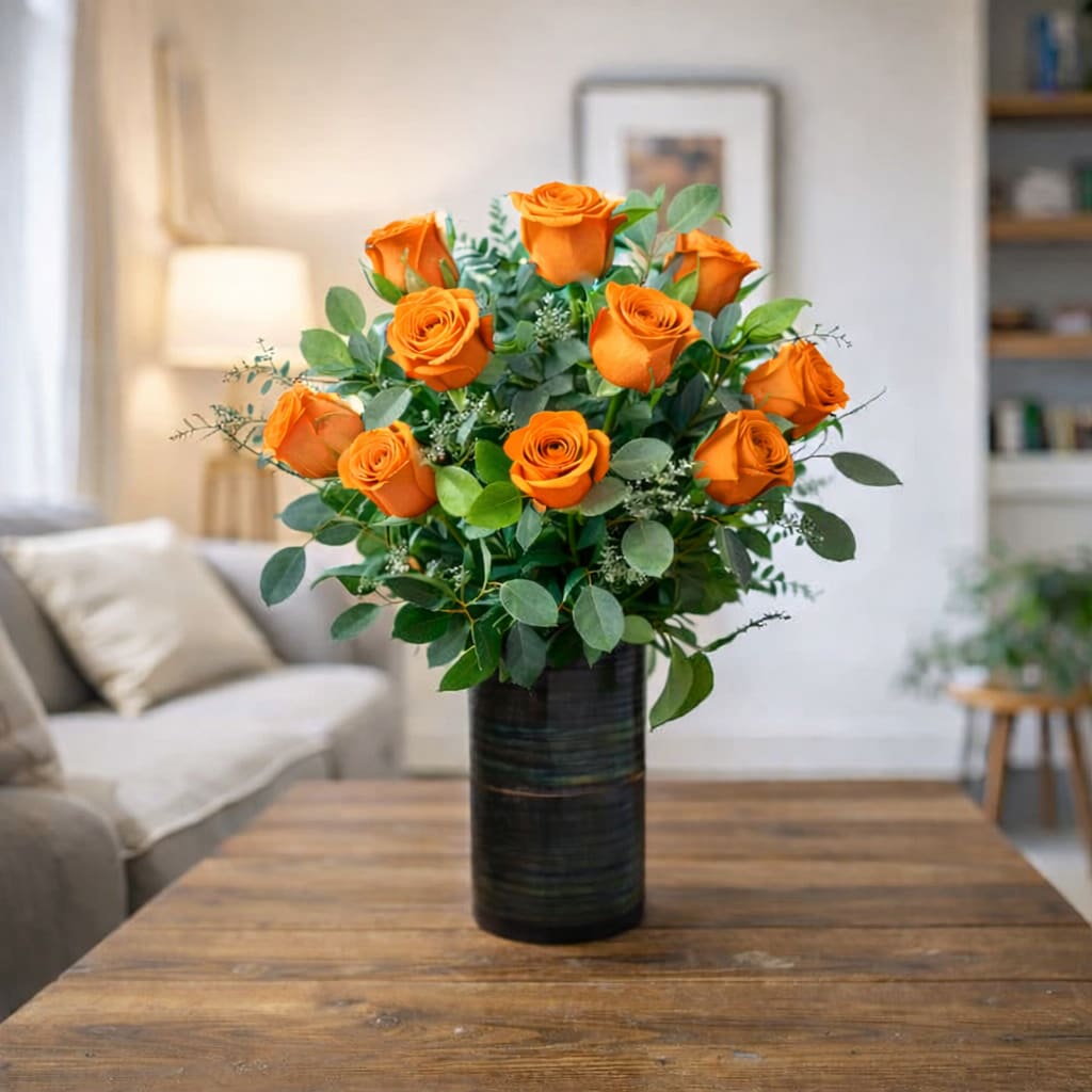 DELUXE ORANGE ROSES. An arrangement by Petals and Co..