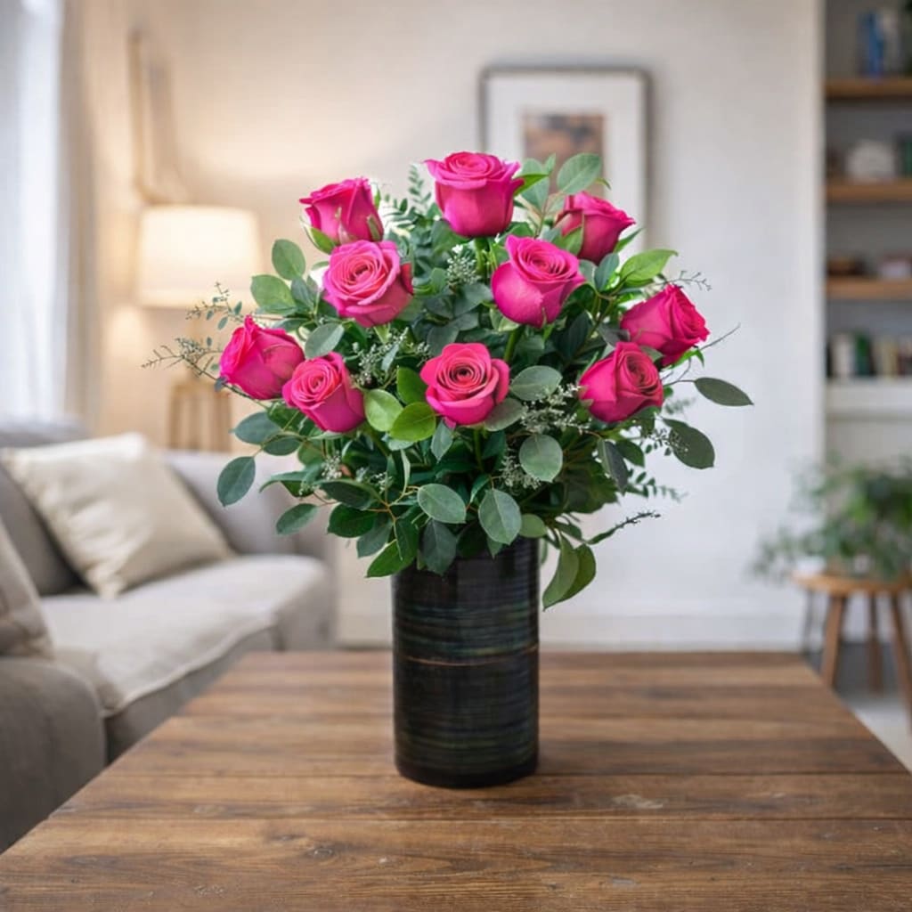 DELUXE HOT PINK ROSES. An arrangement by Petals and Co..