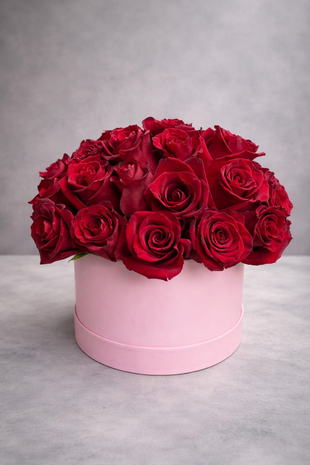 Red roses in box. An arrangement by Grower's Flower Market and Gifts.