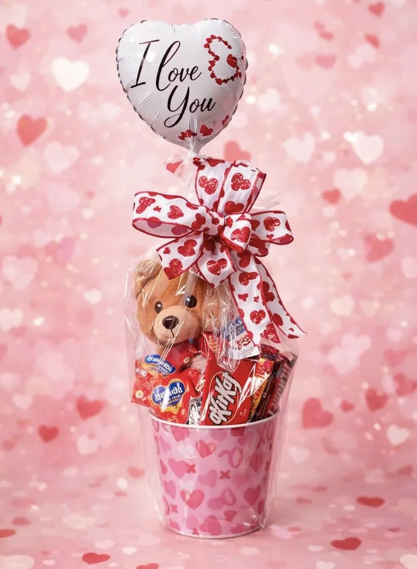 Valentine's Day Candy Basket (With Plush Sitting Bear). An arrangement by Petals and Co..