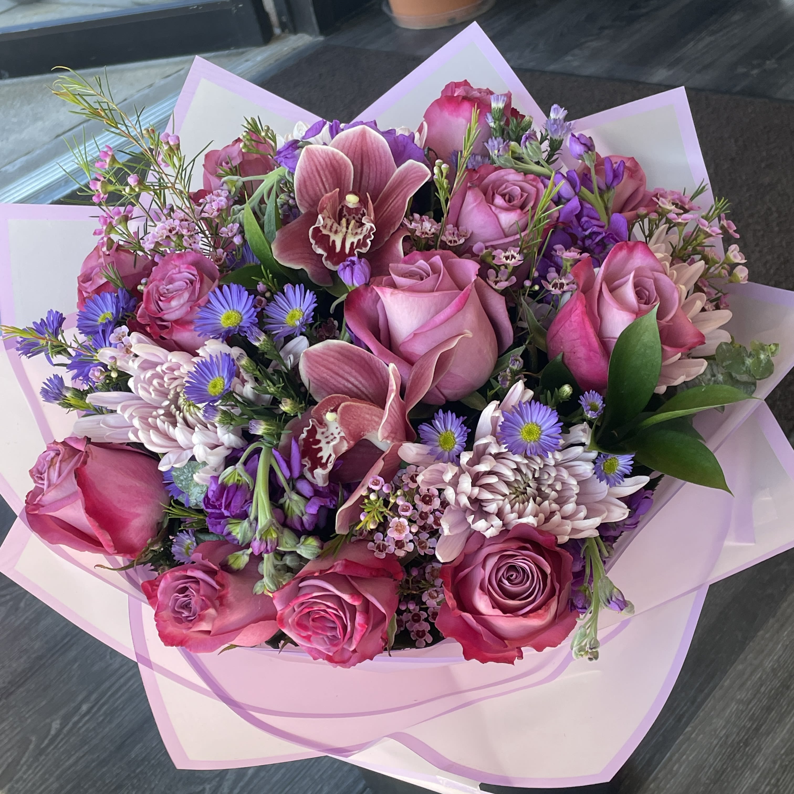 Marvelous Purple. An arrangement by Violeta's Flower Shop.