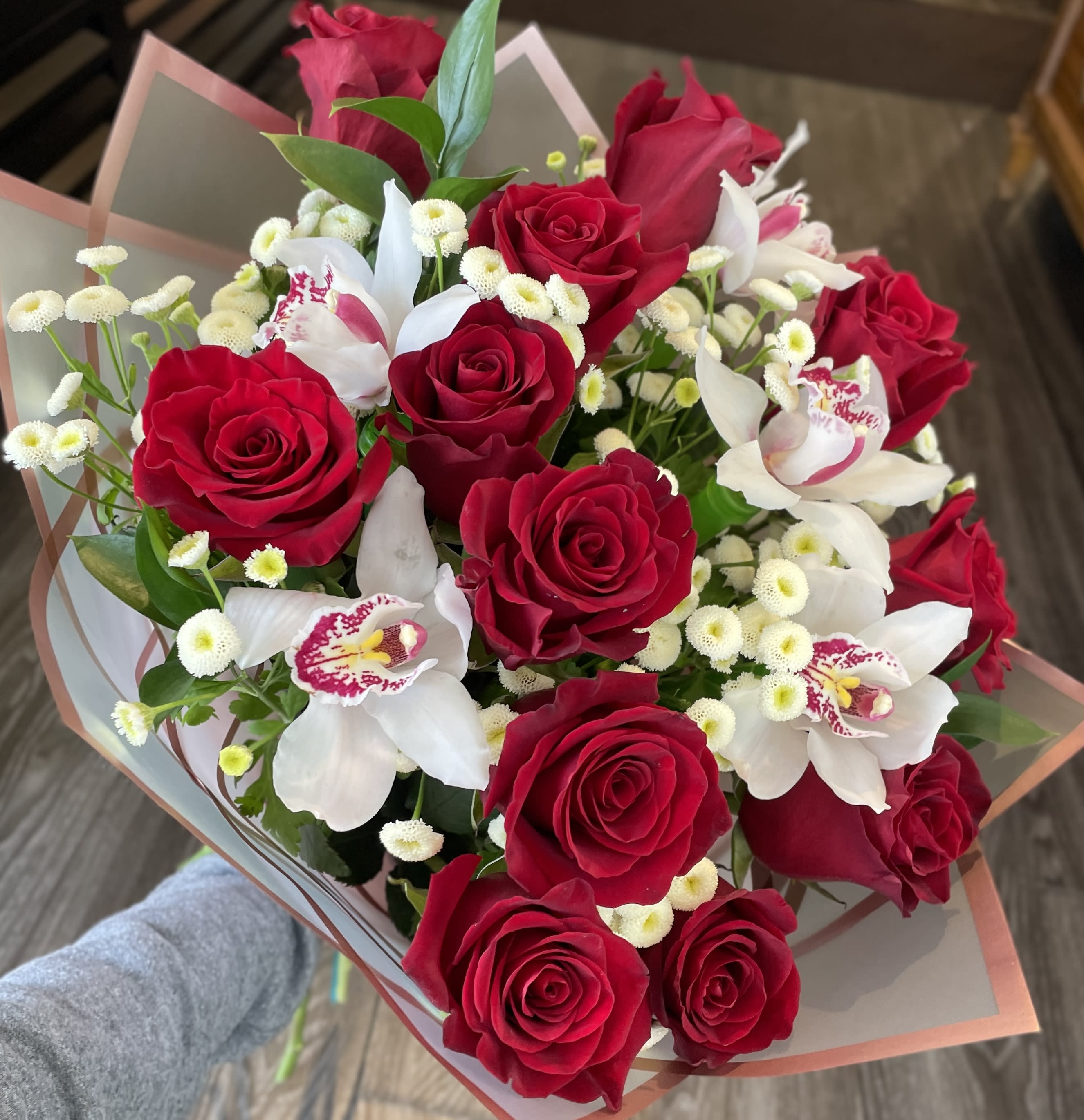 Roses and Orchids Bouquet. An arrangement by Violeta's Flower Shop.