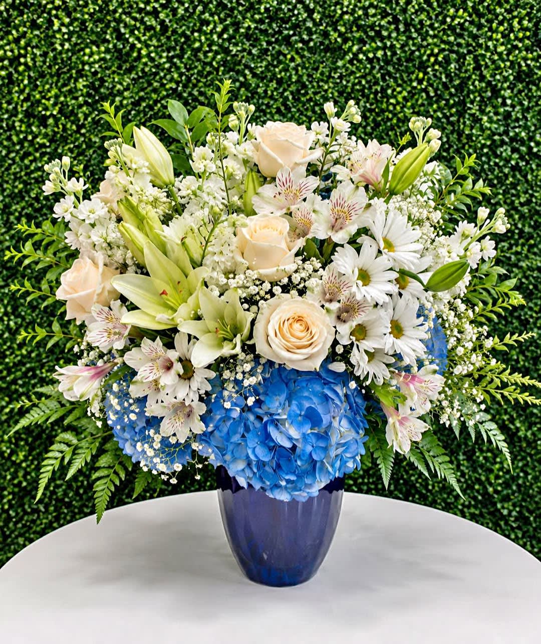 Blue Meadow Elegance. An arrangement by Cincyfloralnista.