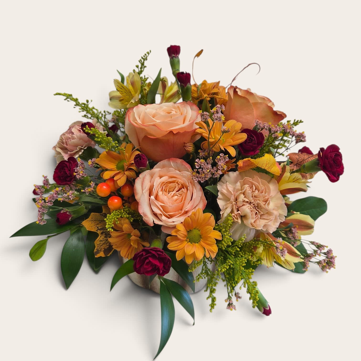 Enchanting Autumn Pumpkin. An arrangement by Flower Trends Florists.