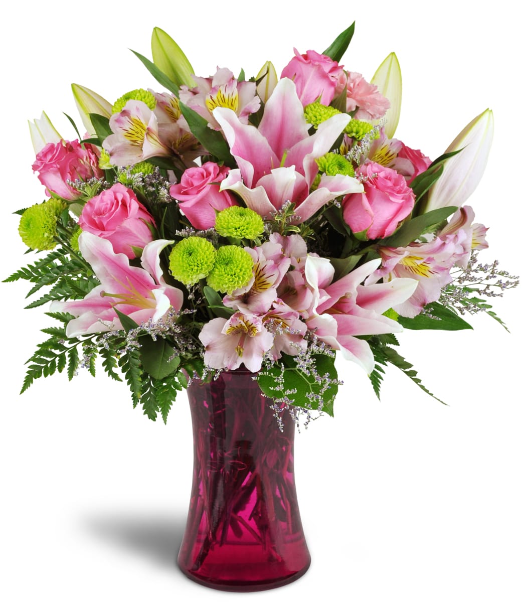Perfectly Pink™. An arrangement by Balloons and Bears. Your arrangement will include bright pink roses, carnations, and alstroemeria, plus lime...