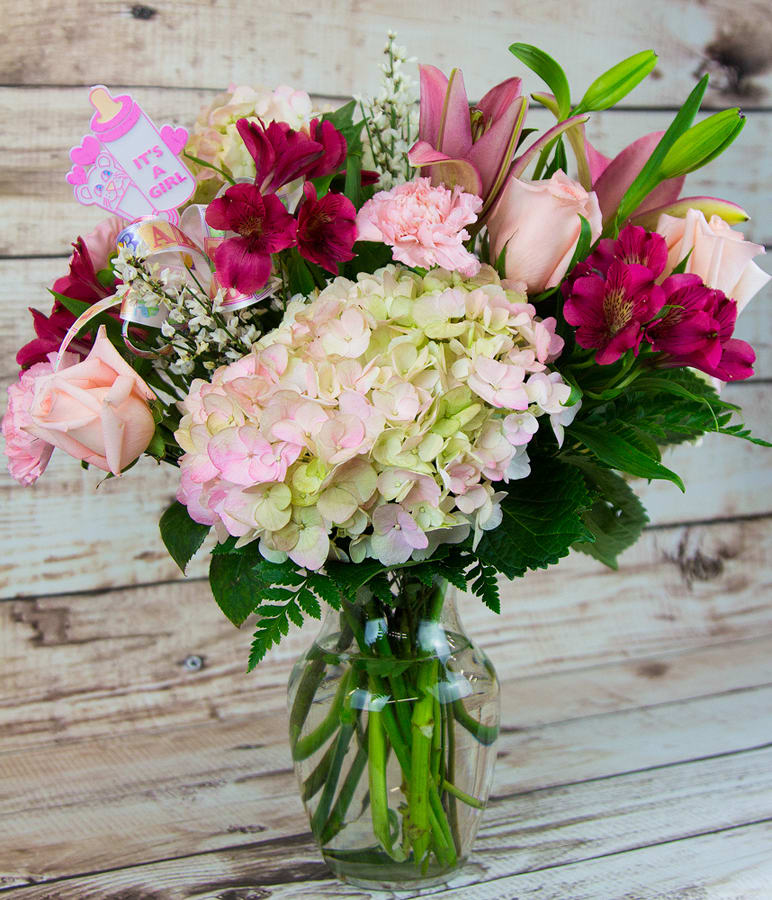 Flower Girl. An arrangement by Merritt Florist.