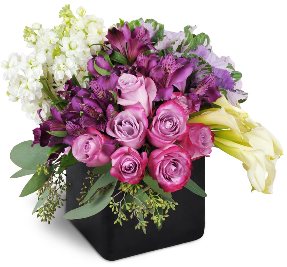 Breathtaking Beauty™. An arrangement by Palmetto Bay Flowers. This stunning bouquet includes lavender roses, purple Peruvian lilies, white stock,...