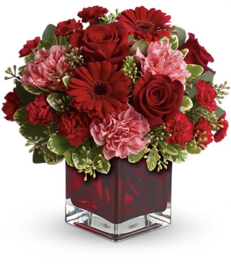 Together Forever by Teleflora. An arrangement by The Flower Boutique.
