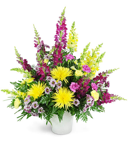 Warm Remembrance. An arrangement by Evergreen and Lily Floral Studio and Gifts. Beautiful snapdragons, fuji mums, and carnations are arranged in...