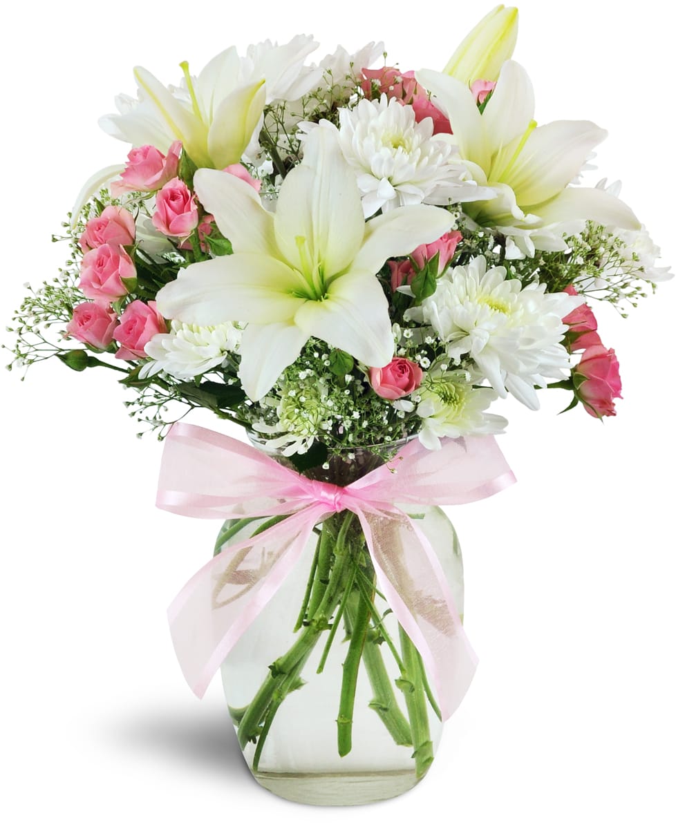 Little Sweetheart. An arrangement by Hills Valley Floral. Pink spray roses, white chrysanthemums, and baby's breath are expertly arranged in a...