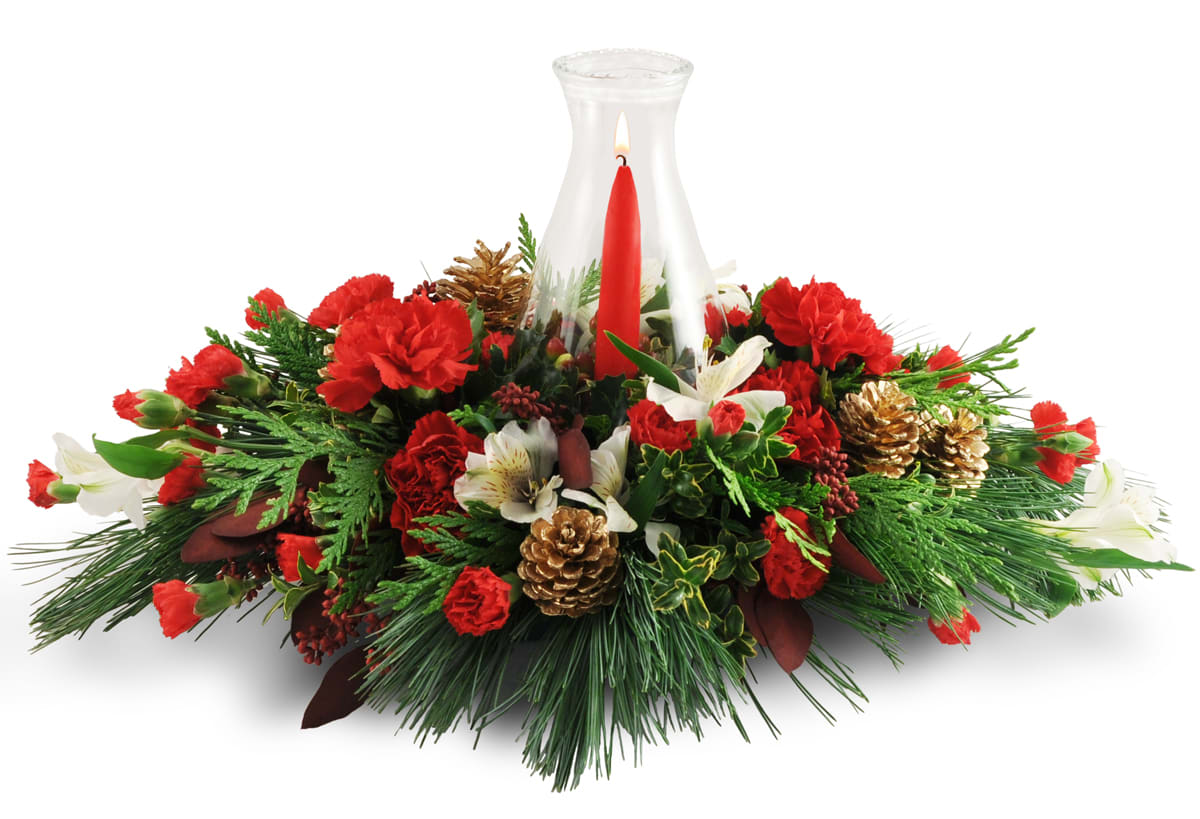 Warming Glow. An arrangement by Colonial Flowers and Gift Shoppe. Carnations, alstroemeria, pinecones, cedar, and more are topped with a taper...
