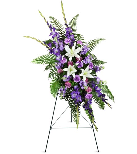 Lavender Memories Spray™. An arrangement by YSD Events and Flowers. Ease feelings of sorrow with white Asiatic lilies, purple gladiolus, lavender...