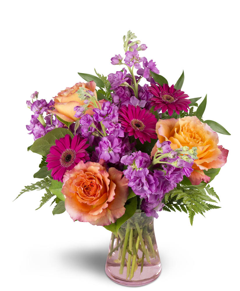 Invigorate™. An arrangement by Hills Valley Floral. This eye-catching arrangement includes roses, mini Gerbera daisies, and more.. Invigorate™. An arrangement by Hills Valley Floral. This eye-catching arrangement includes roses, mini Gerbera daisies, and more..