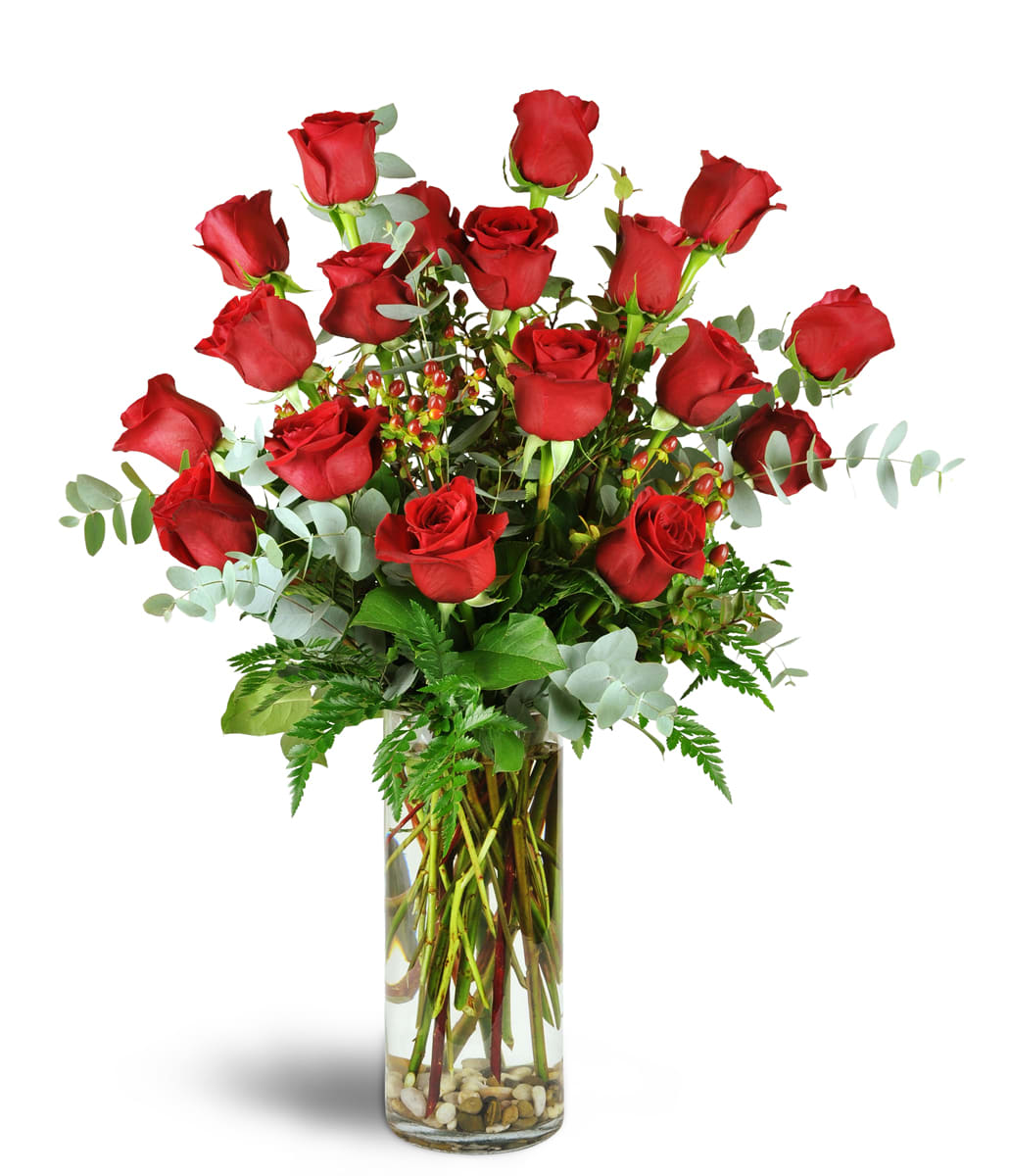 Roses are Romance™. An arrangement by Amazon Flowers. Long-stemmed roses are elegantly arranged with eucalyptus and hypericum berries..