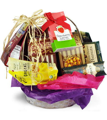 Sweet Treats. An arrangement by Cincyfloralnista. Approximately one dozen packets of assorted sweet treats are bundled in a basket and ready to...
