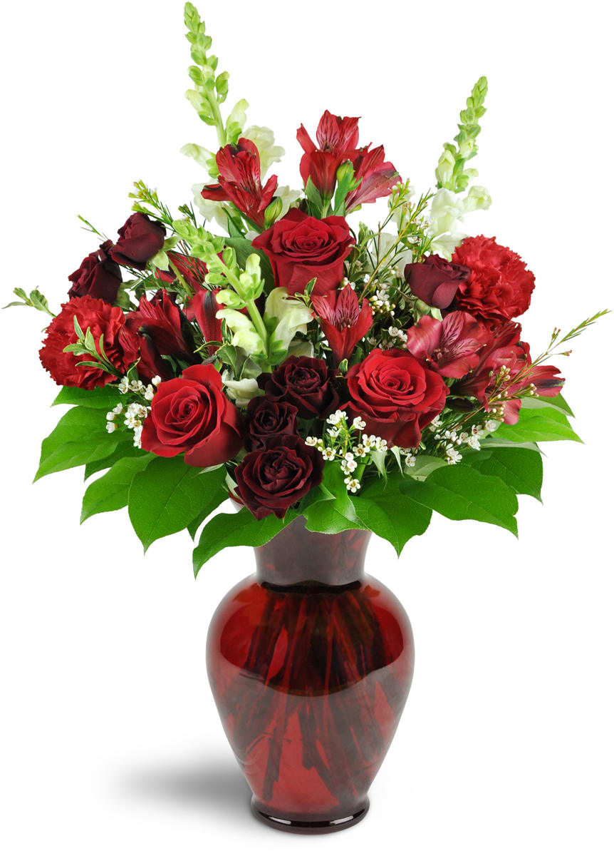 Rosy Rapture™. An arrangement by The Farm and Floral Market. Red roses, spray roses, and alstroemeria are arranged with white snapdragons and...