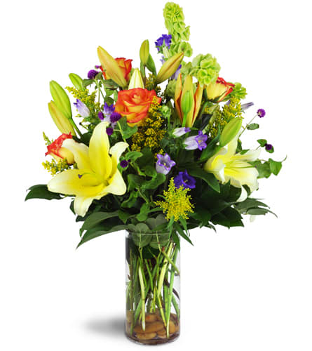 Garden Splendor Bouquet™. An arrangement by Cupid's Petals. Surprise them with lilies, roses, and more arranged in a glass vase and accented with...