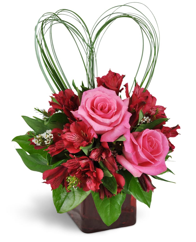 With All My Heart™ Bouquet. An arrangement by Buds and Blooms. Romantic Peruvian lilies and waxflower are perfectly accented with heart-shaped...