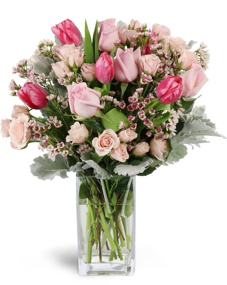Sweetly Scented Pinks™. An arrangement by Cynthia's Flowers and Gifts. Gift them an abundance of pink roses, spray roses, tulips, waxflower, and...