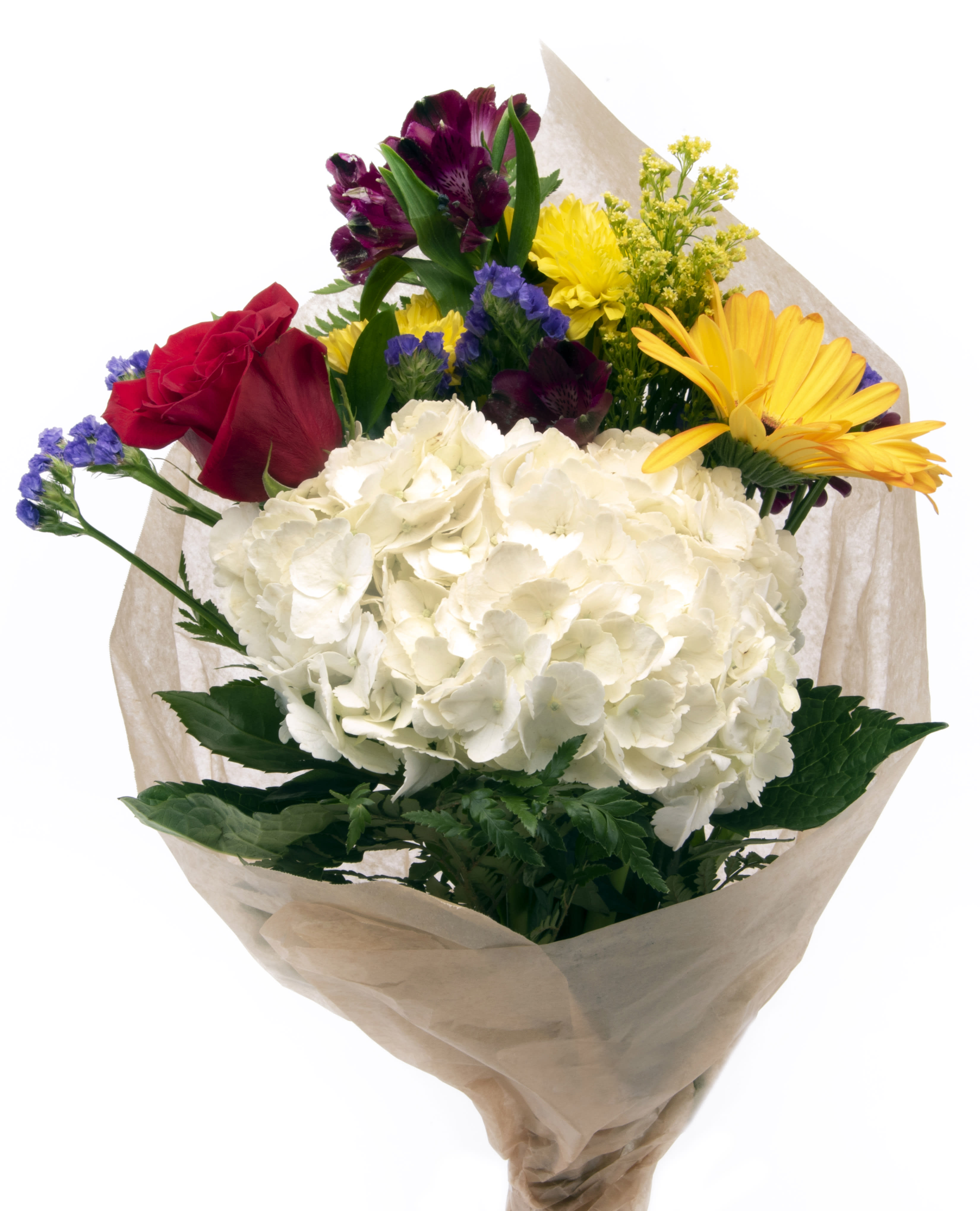 Just Because Mix. An arrangement by Buds and Blooms at Enumclaw. Featuring an assortment of blooms like white hydrangea, purple statice, purple...