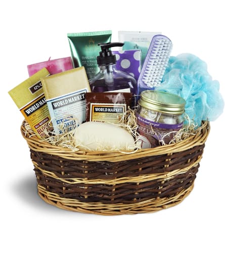 Indulgence Spa Basket™. An arrangement by Sunny Day Blossoms Design Studio. Treat them to a blissful basket of body lotions, soaps, a fragranced...