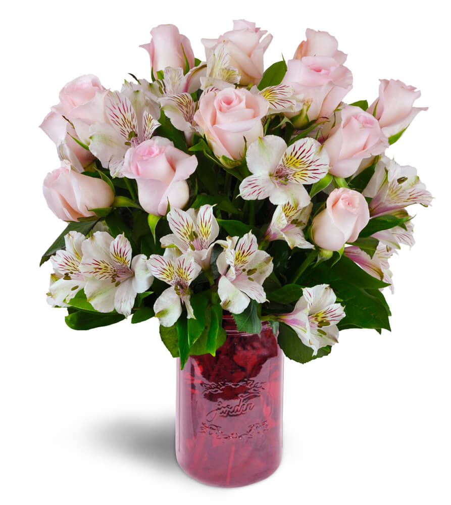 Blushing Love Bouquet™. An arrangement by Kitchener-Waterloo Florist. Gorgeous pink roses and Peruvian lilies are delicately arranged into a...