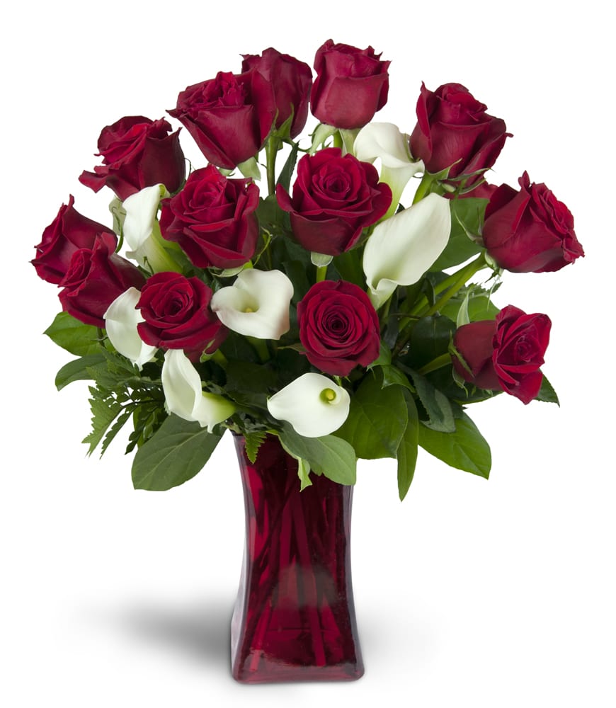 Full of Love™. An arrangement by Flowers n Things. Classic red roses and mini Calla lilies are elegantly arranged in a glass vase. Upgrade to...
