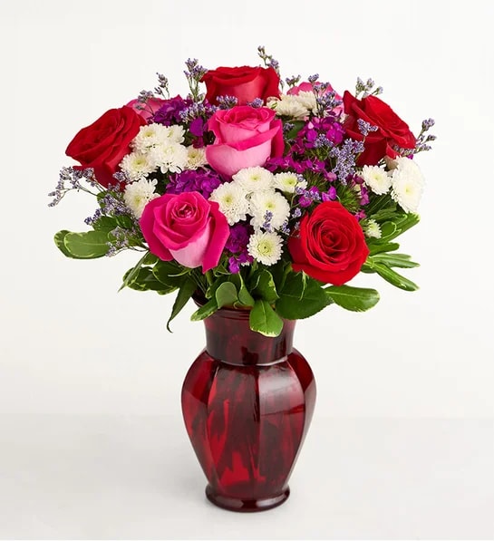 Key To My Heart in Red Vase. An arrangement by Flowers of Jacksonville.