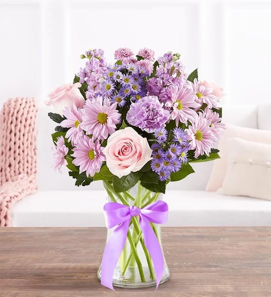 Daydream Bouquet™ in Clear Glass Vase. An arrangement by Flowers of Charlotte.