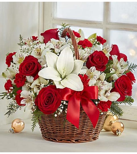 Christmas Basket. An arrangement by Lynette's Flowers and Gifts.