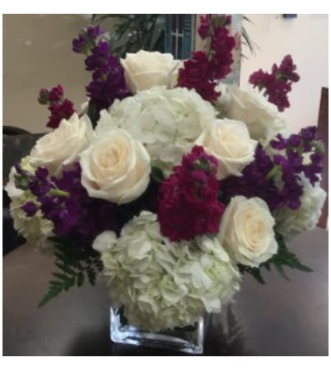 Tarrytown Floral Designs Burgundy Delight. An arrangement by Tarrytown Floral Designs.
