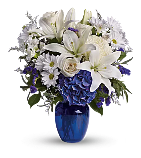 Beautiful in blue. An arrangement by Fine's Flowers.