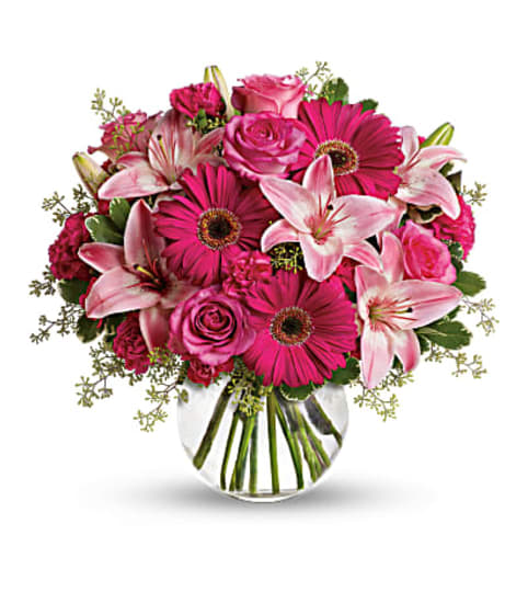 Alittle pick me up. An arrangement by Fine's Flowers.