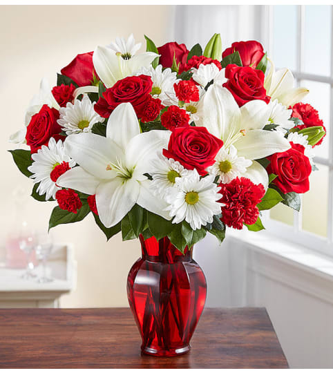 A Red and White Delight. An arrangement by Seasons Change Designs.