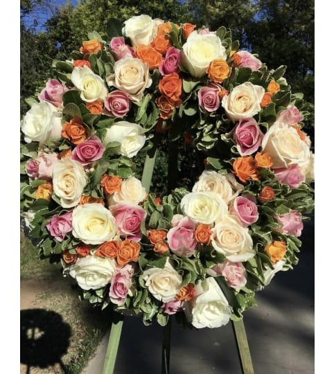 A Sympathy Wreath in All Pastel Roses