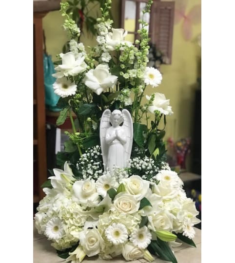 Lovely Angel. An arrangement by Santa Fe Florals and Events.
