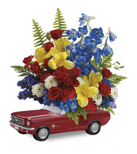 Mustang Full Of Flowers. An arrangement by K1 Floral Studio.