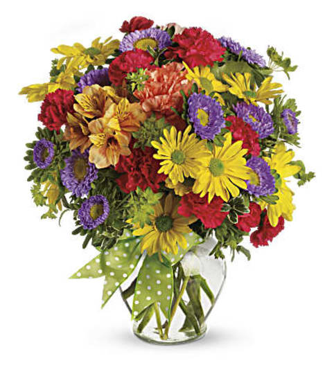 Make wishes. An arrangement by Avenida Flowers.