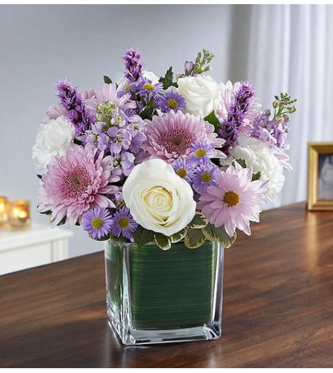 PURPLE TEARS. An arrangement by J.D. Ballantine's Flowers and Gifts.