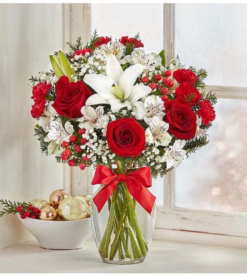 HOLIDAY FIELDS. An arrangement by J.D. Ballantine's Flowers and Gifts.