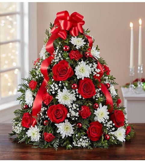 The Holiday Tree®. An arrangement by Butterflies Flower Shop.