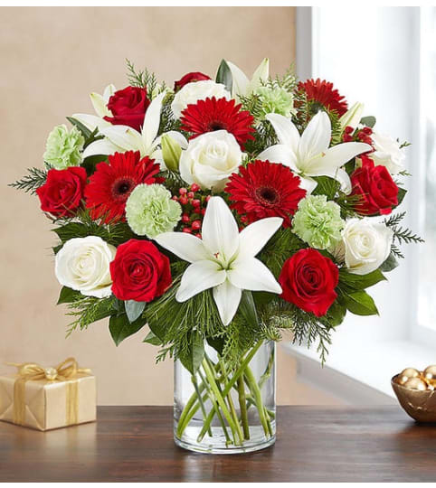 Garden Grandeur™ Holiday. An arrangement by Butterflies Flower Shop.