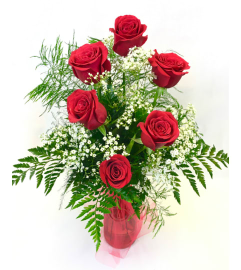 Addicted To Love with 6 red roses. An arrangement by Say It With Flowers.