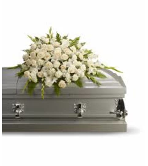 coffin and 10 piece floral arrangement