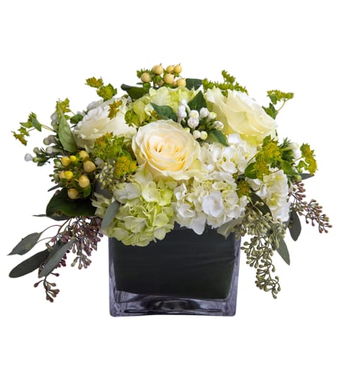 Lush life cube. An arrangement by Prestige Floral.