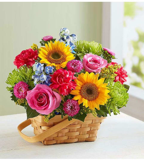 SUNNY GARDEN. An arrangement by J.D. Ballantine's Flowers and Gifts.